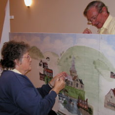 Charles Clayson and ? working on embroidery