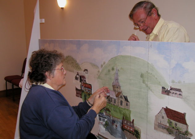 Charles Clayson and ? working on embroidery