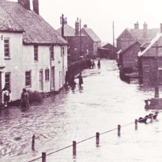 Late 1940s or early 1950s. The family on the doorstep of Barnards is the Godwards, the little girl Hazel, later Hazel Pamplin