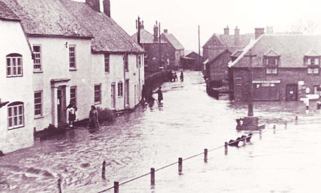 Late 1940s or early 1950s. The family on the doorstep of Barnards is the Godwards, the little girl Hazel, later Hazel Pamplin