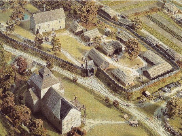 Detail of the  model of East Meon in Domesday times, showing the curia, or farm headquarters, of The Court House as well as the Saxon hall which preceded the 14th century structure we see today. | Musee de la Tapisserie, Bayeux
