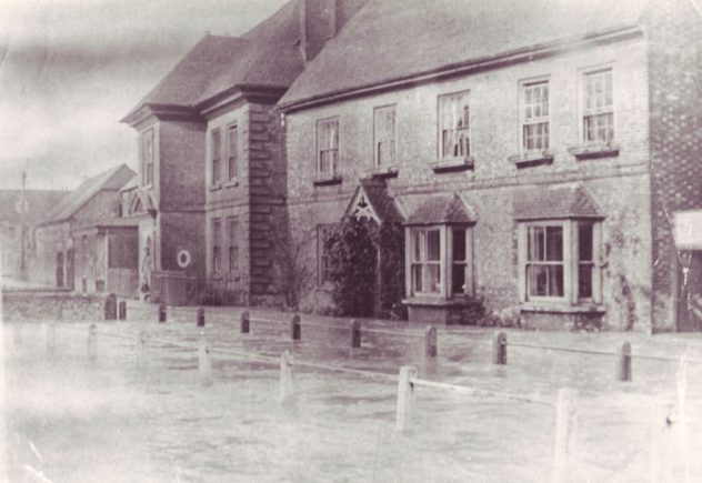 This view of the flooded High Street is from the album of '50s photos at Ye Olde George.