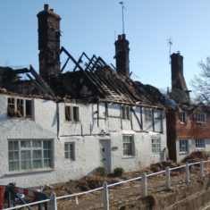 The remains of the second thatch fire at Hockley & Brook Cottages, 2013. | Michael Blakstad