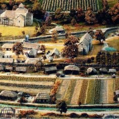The village as it might have been in 1086, imagined by Elizabeth Lewis and Edward Roberts, now on display in the Musee de la Tapisserie, Bayeux
