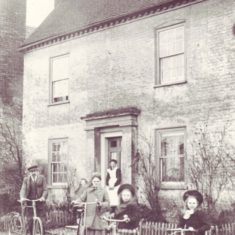 Nurse Micklam and family outside Barnards
