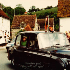 Queen place mat An opportunistic place mat created by Ye Olde George Inn from a photograph ofHM Queen Elizabeth II visiting the village, either for a ceremony at HMS Mercury or to call on Adrian Pelley, retired Windsor estate manager; | Michael Blakstad