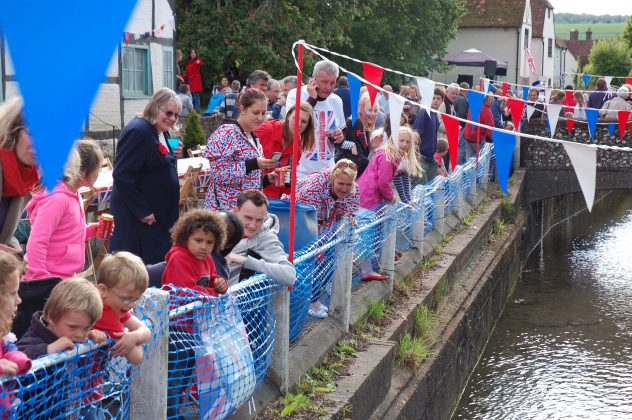 Spectators along river