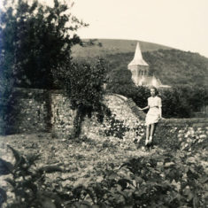 Woodfields - Olivia on wall with church behind Olivia Woodfield on wall with church behind, WWII