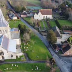 Drone photograph by showing the church and the church hall, barn, and the cottage, barn and gardens at The Court House  | Richard Gaisford