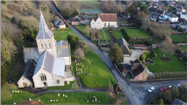 Drone photograph by showing the church and the church hall, barn, and the cottage, barn and gardens at The Court House  | Richard Gaisford