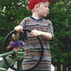 Boy at steering wheel