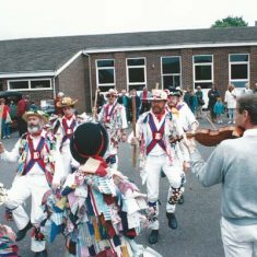Morris dancers and fiddler